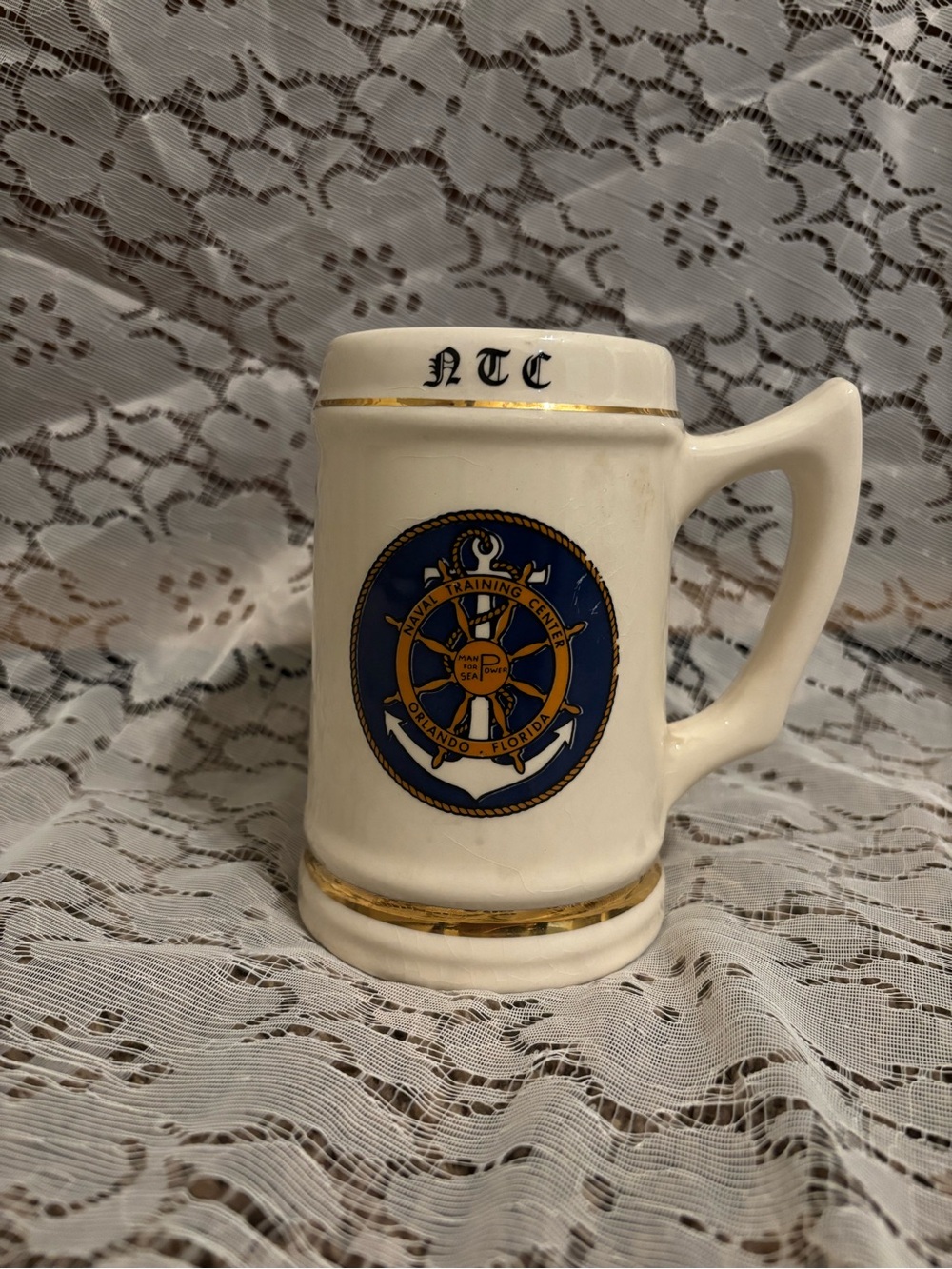 Navy White Ceramic Stein with Blue and Gold Emblem